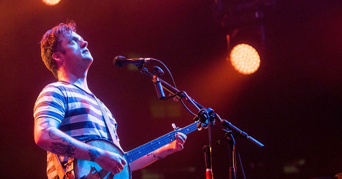 Modest Mouse selling gear & giving away an iconic banjo