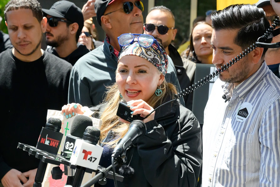 Rob Solano and Maria Member at Hands of NYC Rally at 26 Federal Plaza