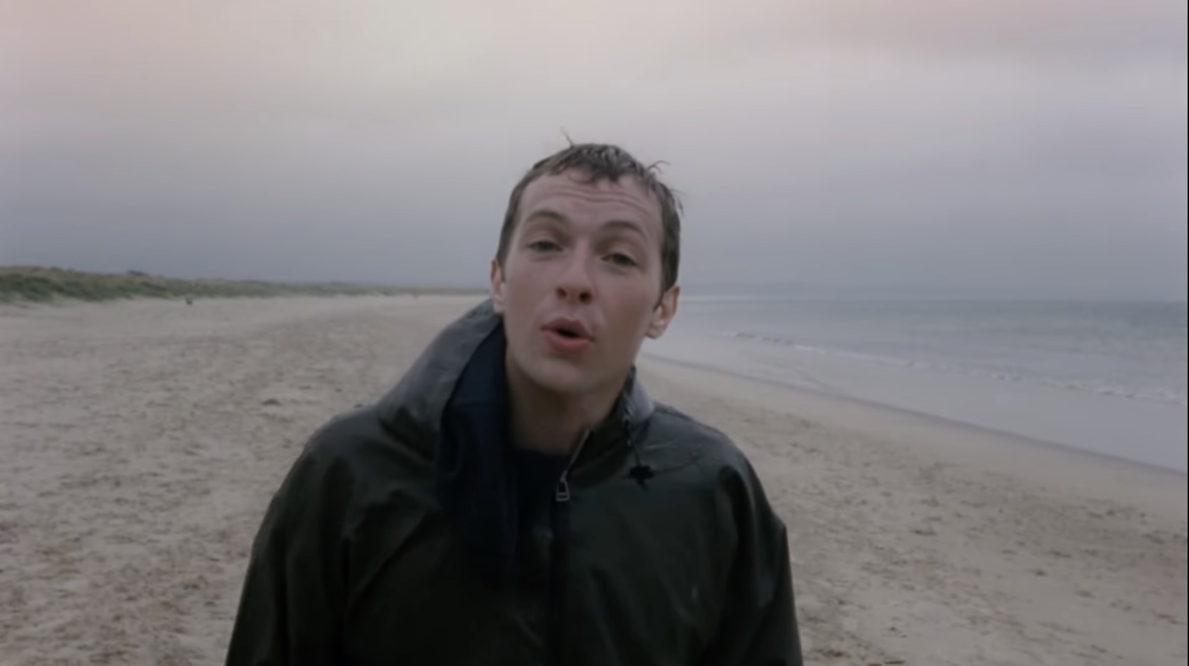 IDLES repurpose Coldplay's "Yellow" video with Chris Martin's help for "Grace"