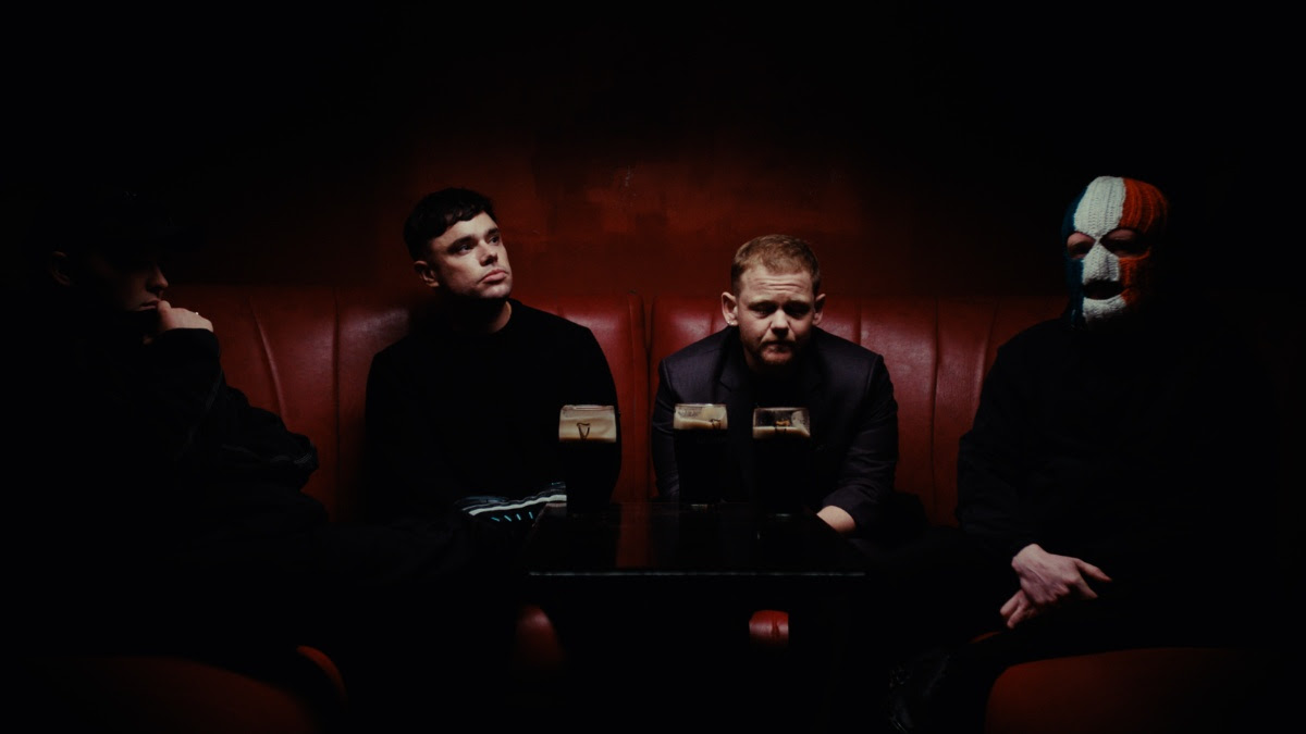 Kneecap share powerful Kae Tempest collab “Irish Goodbye” (watch the short film)